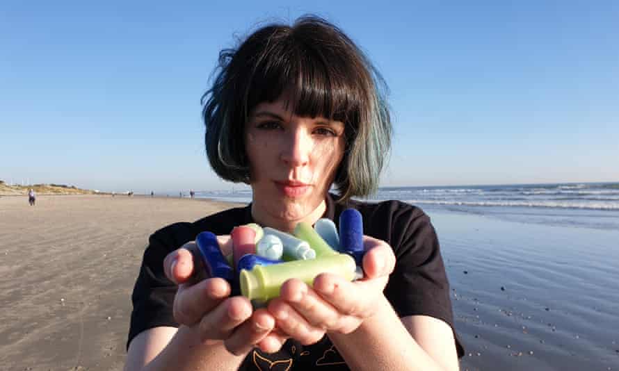 Ella Daish with a handful of plastic tampon applicators