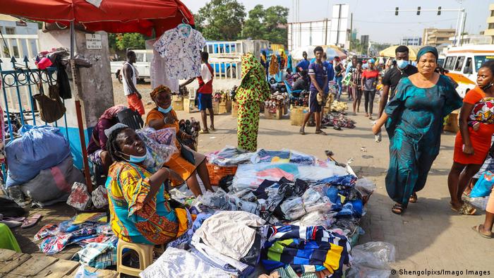 Woman selling fabrics at a market in Accra, 