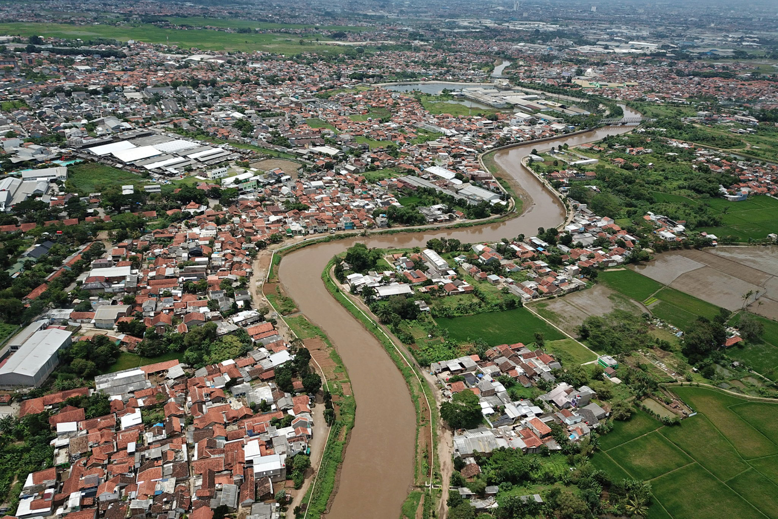 The Citarum flows through a densely populated area in Bandung.