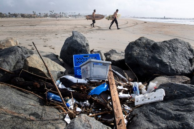 A week of storms left trash and plastic debris at the Seal Beach jetty in Seal Beach in 2019. (Photo by Paul Bersebach, Orange County Register/SCNG)