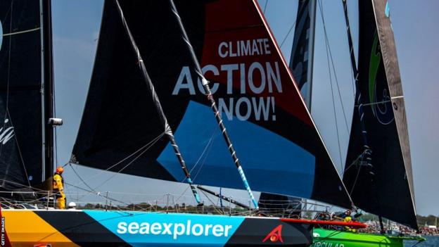 Team Malizia's boat, which bears the slogan 'Climate Action Now!' on its sail